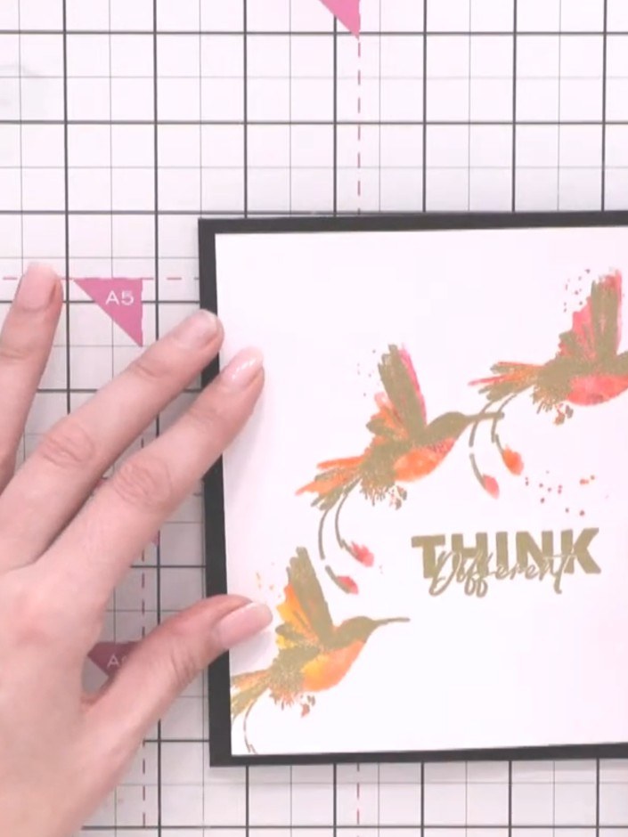 Step 15: Mount your finished stamped and embossed panel onto a black card blank. Position it centrally and secure with 