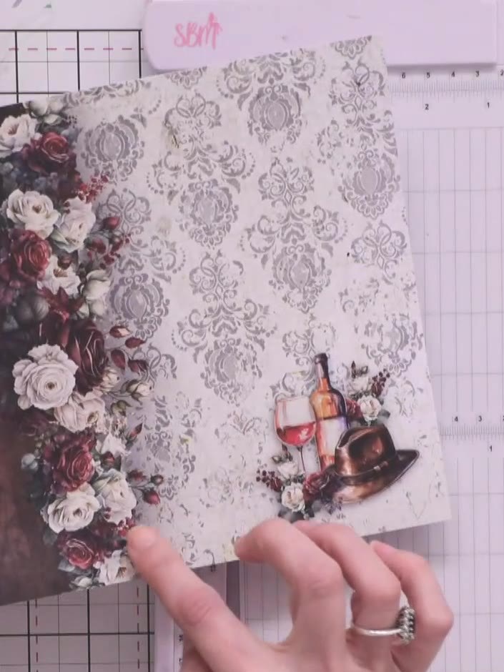 Step 3: Distress the edges of your cut paper pieces using a vintage-coloured distress ink pad. Work around the perimet