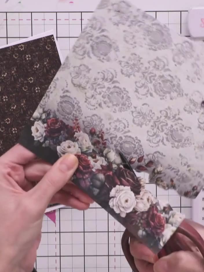 Step 7: Die-cut a pocket piece from the dark floral patterned paper using scissors or a die-cutting machine. This piec
