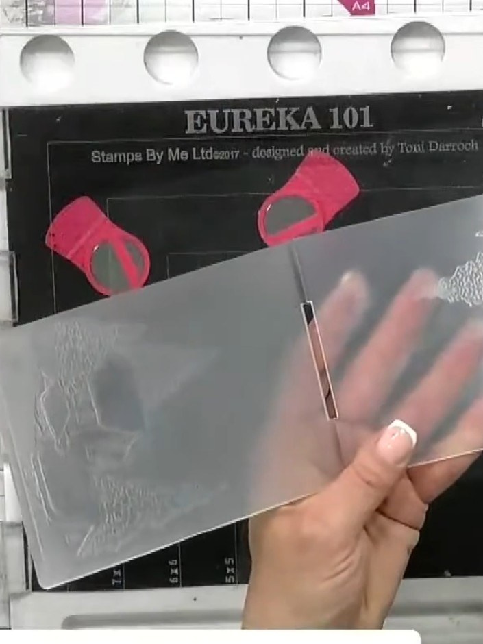 Step 1: Open your embossing folder and feel the base with your fingers to identify which side creates the deboss (impr