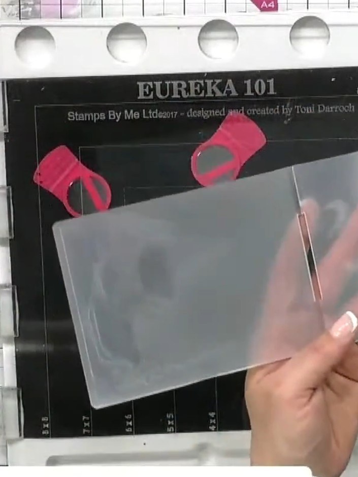 Step 2: Run a piece of black card stock through your die-cutting machine using the embossing folder. Check your machin