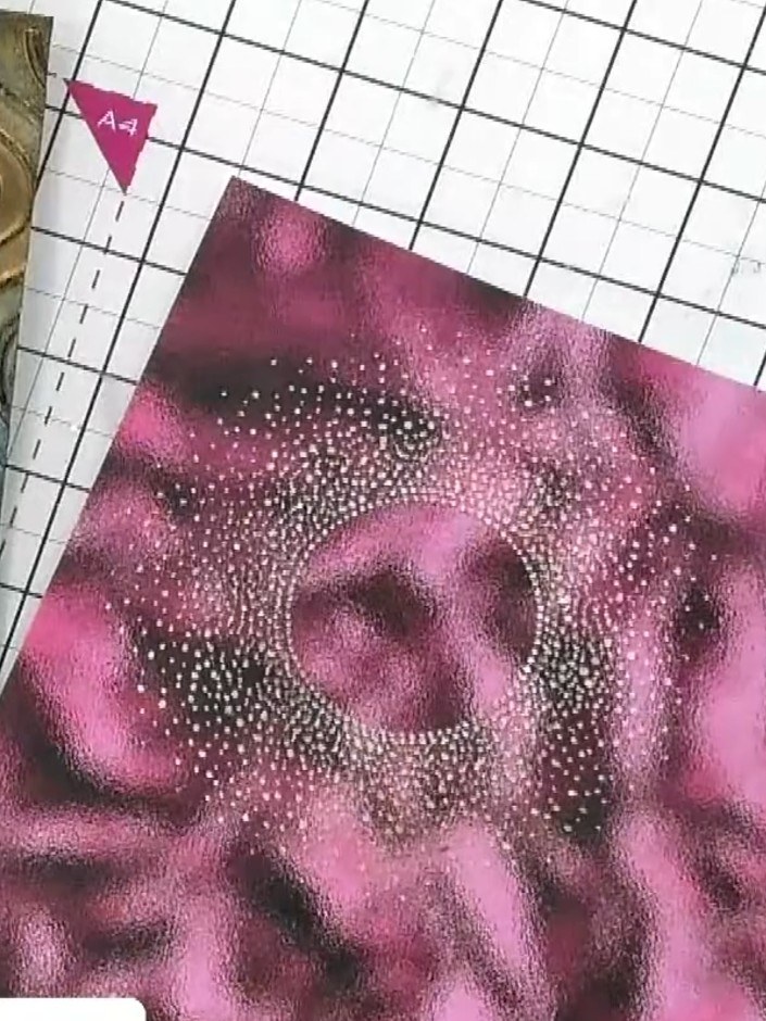 Step 3: Apply gold ink pad over the sanded areas of the pink embossed card to add colour and definition to the design.