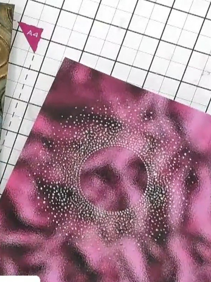 Step 4: View the finished card with its magical sunburst effect created by the embossed pattern, gold ink, and pink sh