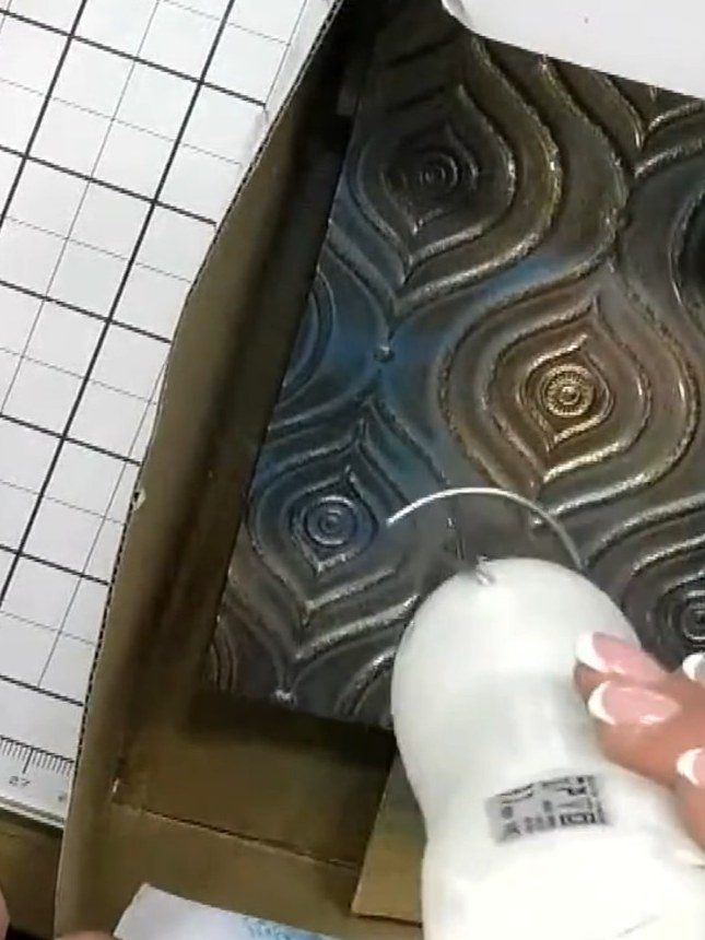 Step 2: Gently swirl your acrylic spray cans to wake up the product, being careful not to shake them vigorously or blo