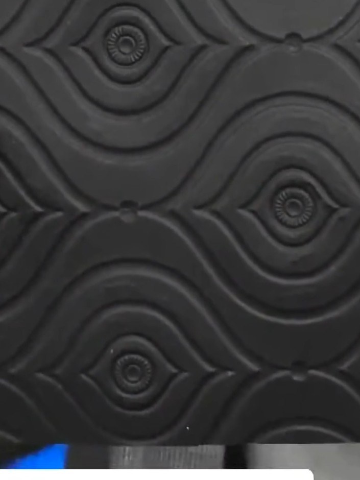 Step 7: View the finished embossed card with its metallic spray finish and ink detailing. The combination of the decor