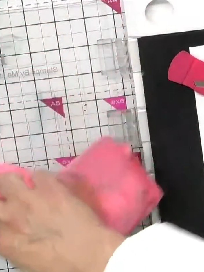 Step 3: Apply the splodge or splat stamp to your white card base using watercolour inks in purple and blue tones. Pres