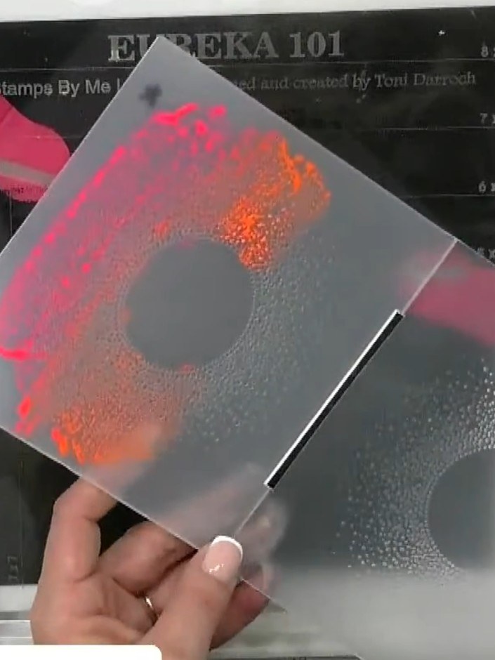 Step 4: Run your card stock through the die-cutting machine with the painted embossing folder to transfer the blended 
