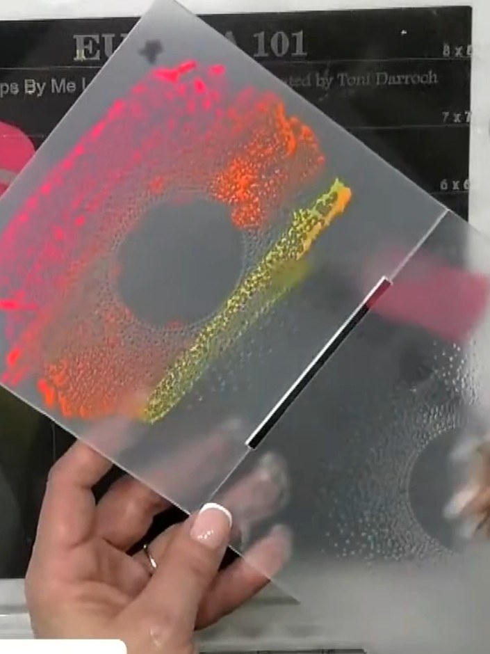 Step 5: Lightly dry the embossed card with the watercolour effect using a heat tool or allow to air dry naturally to s