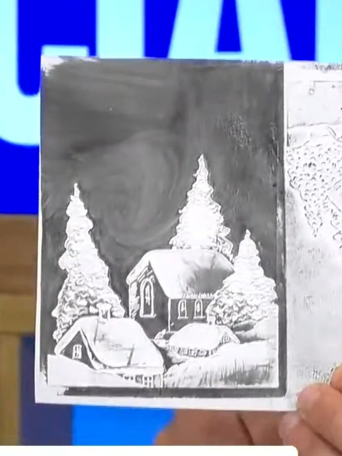 Step 1: Apply midnight black ink directly onto the surface of your embossing folder using an ink pad. Work the ink acr