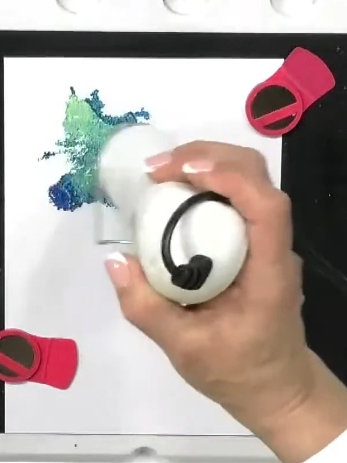 Step 2: Apply multiple shades of blue ink to the background stamp. Press the stamp onto the white card to create a col