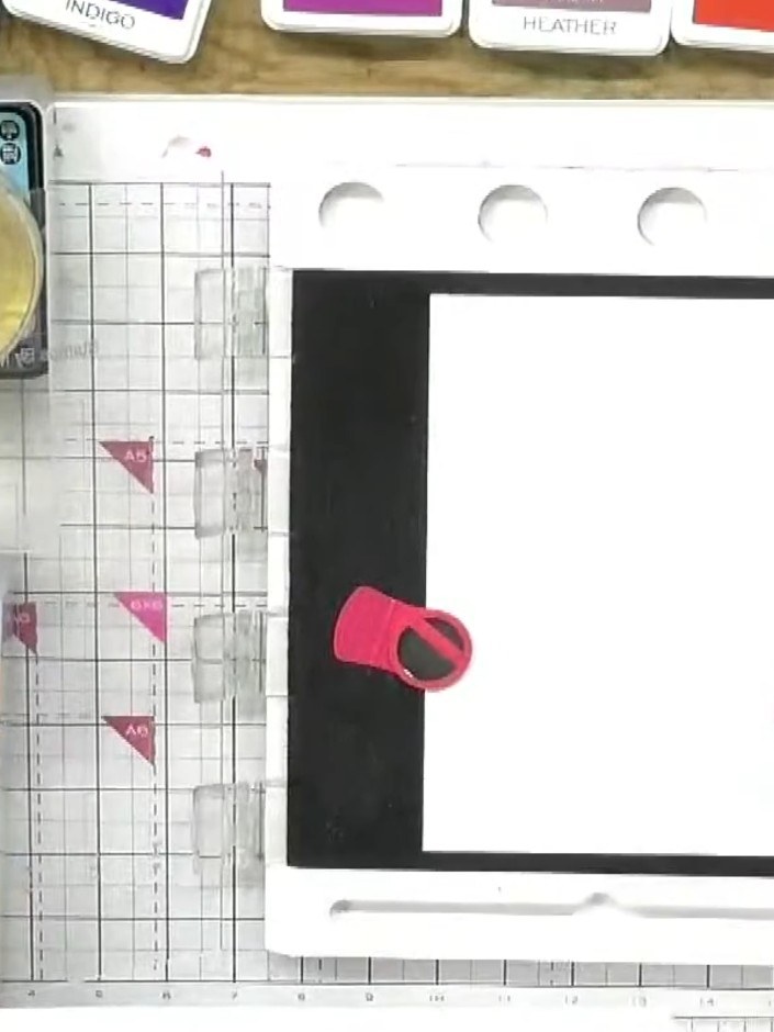 Step 1: Pick up magenta ink on a dauber and apply it to the top portion of the tulip stamp.