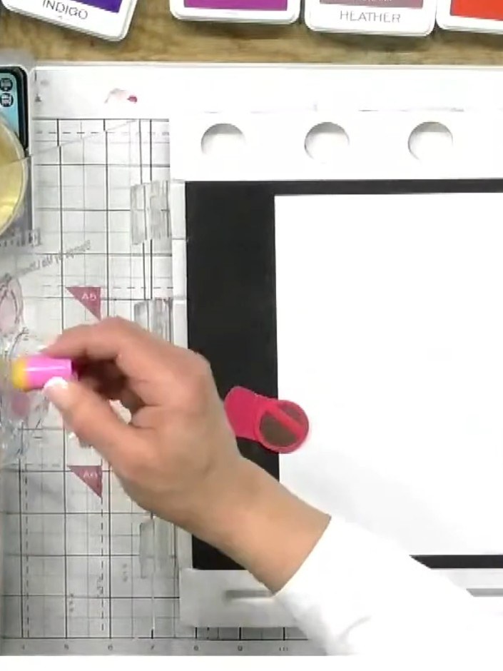 Step 3: Add a touch of yellow ink to the centre point of the tulip stamp where the pink and white ombre colours meet. 