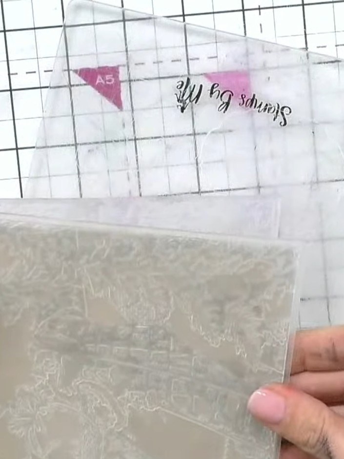 Step 2: Place the embossing folder with your craft card inside through your die-cutting machine to create the embossed