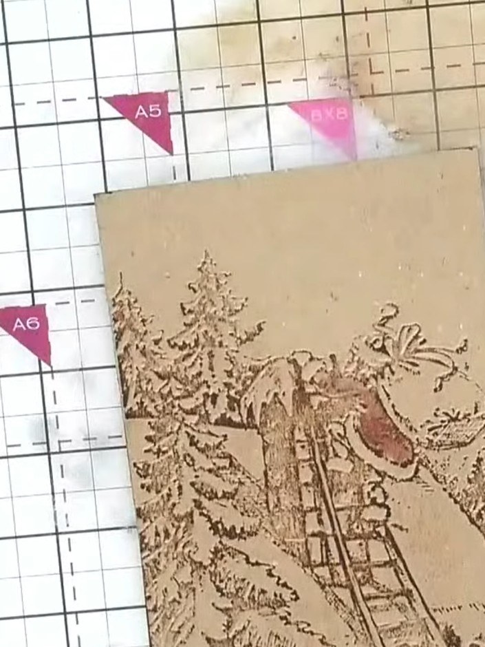 Step 9: Mount the finished embossed and painted piece onto your card base, ensuring it is centred and secure.