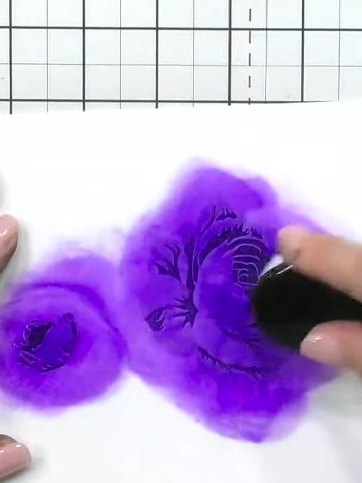 Step 10: Mount the finished purple rose onto your card base or use it as a standalone piece of artwork. Position it cen