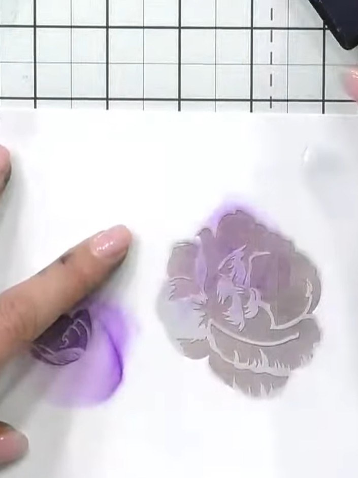 Step 7: For the fourth layer, swap to a green ink pad. Lightly tap the green ink through the stencil to add colour to 