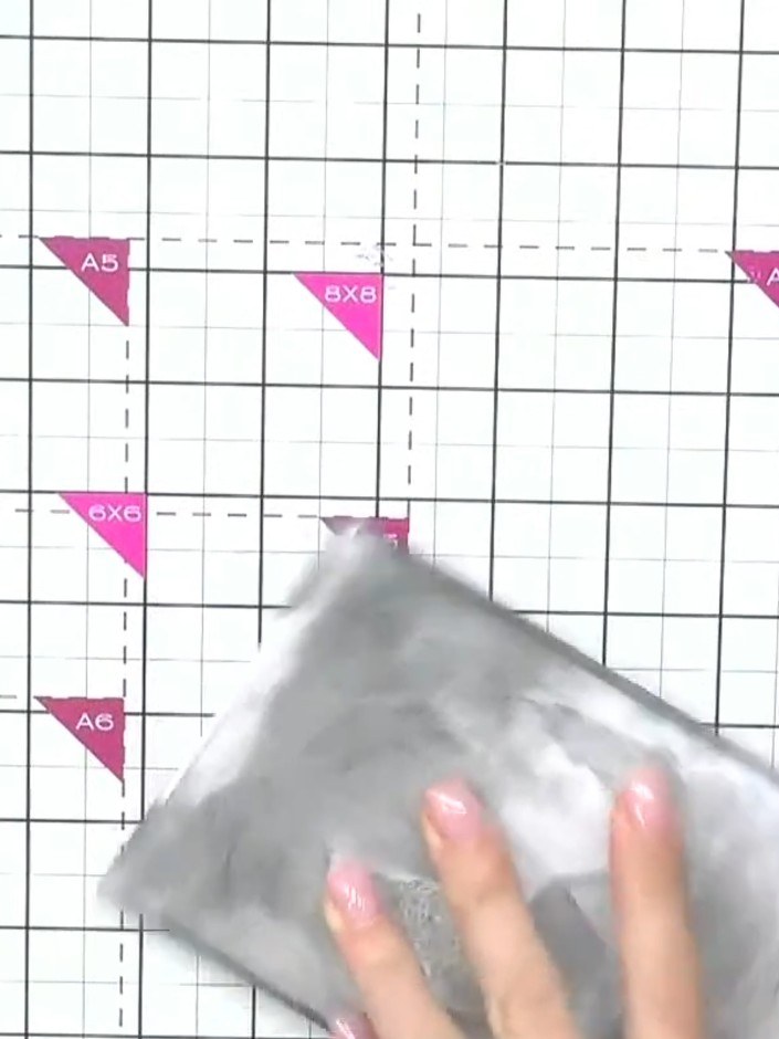 Step 3: Place your embossing folder with the card inside onto the cutting mat. Run the card through your die-cutting m