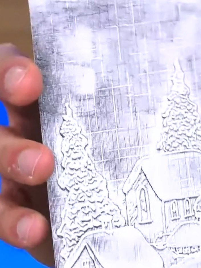 Step 5: If the black impression is not dark enough, re-ink the embossing folder and run the card through the machine a
