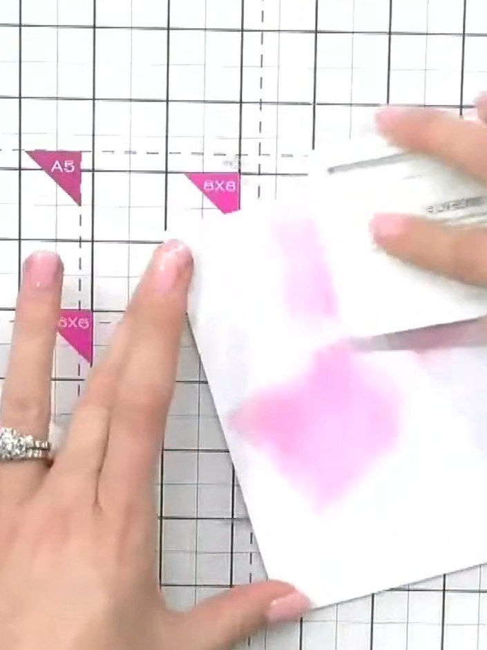 Step 1: Take a piece of white card stock and swipe random coloured inks across it to create a coloured background. Use