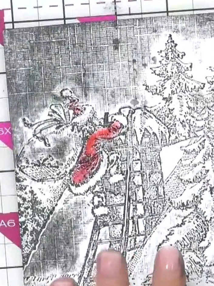 Step 8: Mount the finished embossed and coloured Santa panel onto a card blank. Add an appropriate Christmas sentiment