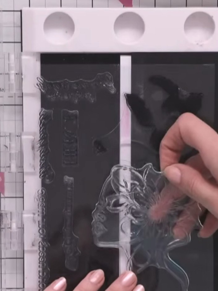 Step 4: Heat set the gold embossing powder with a heat gun, working quickly and evenly across the stamped image to mel