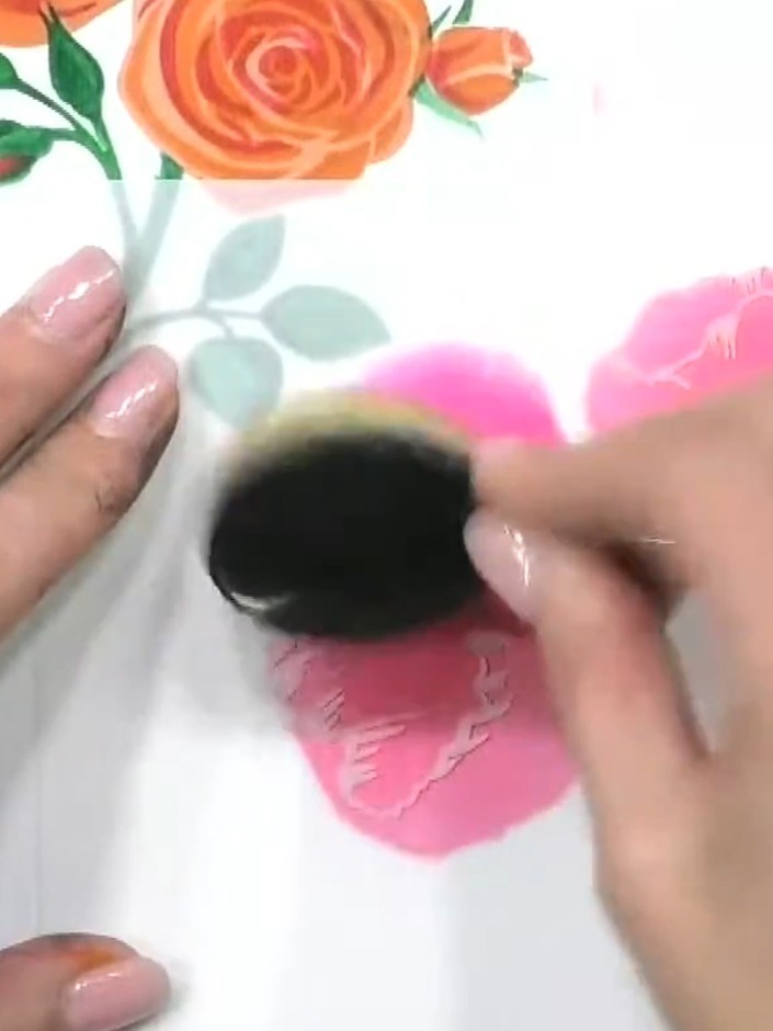 Step 3: Position stencil number two over your first pink layer, carefully lining up the corner registration hearts to 