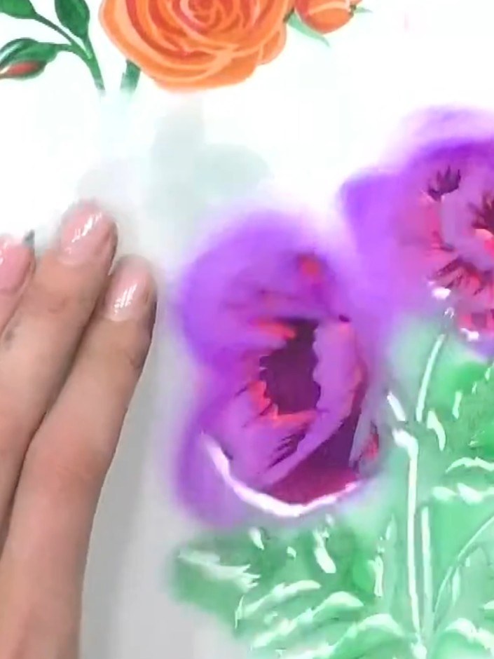 Step 6: Position stencil number four over your design and apply green ink to add the poppy's foliage and stem details.