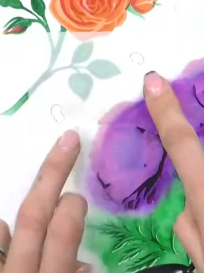 Step 7: Apply stencil number five over the purple flower petals, pressing firmly to transfer the delicate petal detail