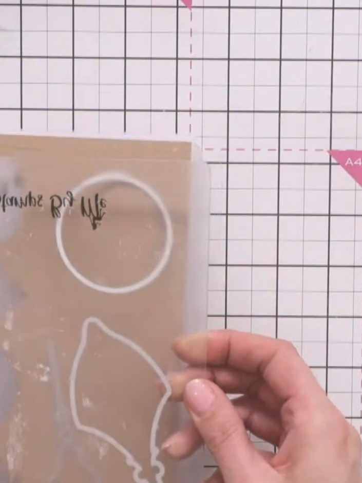 Step 1: Cut the exterior bauble shape from kraft card using the die plate. The die will cut the outline shape with dec
