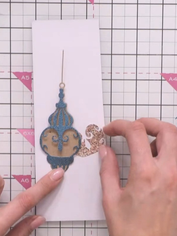 Step 6: Add ink from the top downward on the sides of the bauble to create dimension and shadow. Work the ink graduall