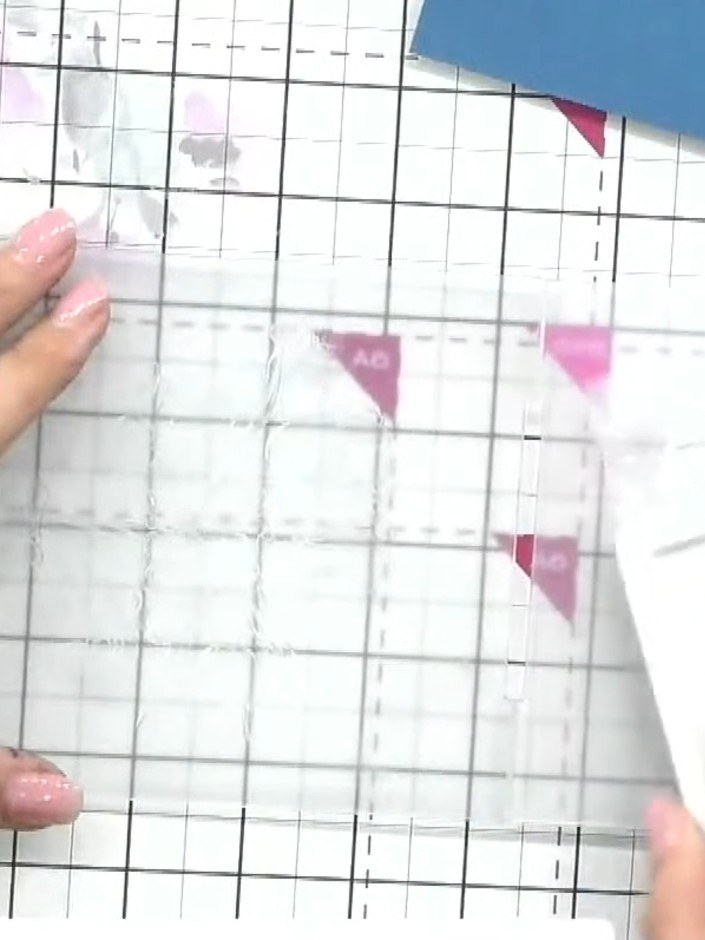 Step 1: Gather your embossing folder, white ink pad, and coloured cardstock. Place the embossing folder on your craft 