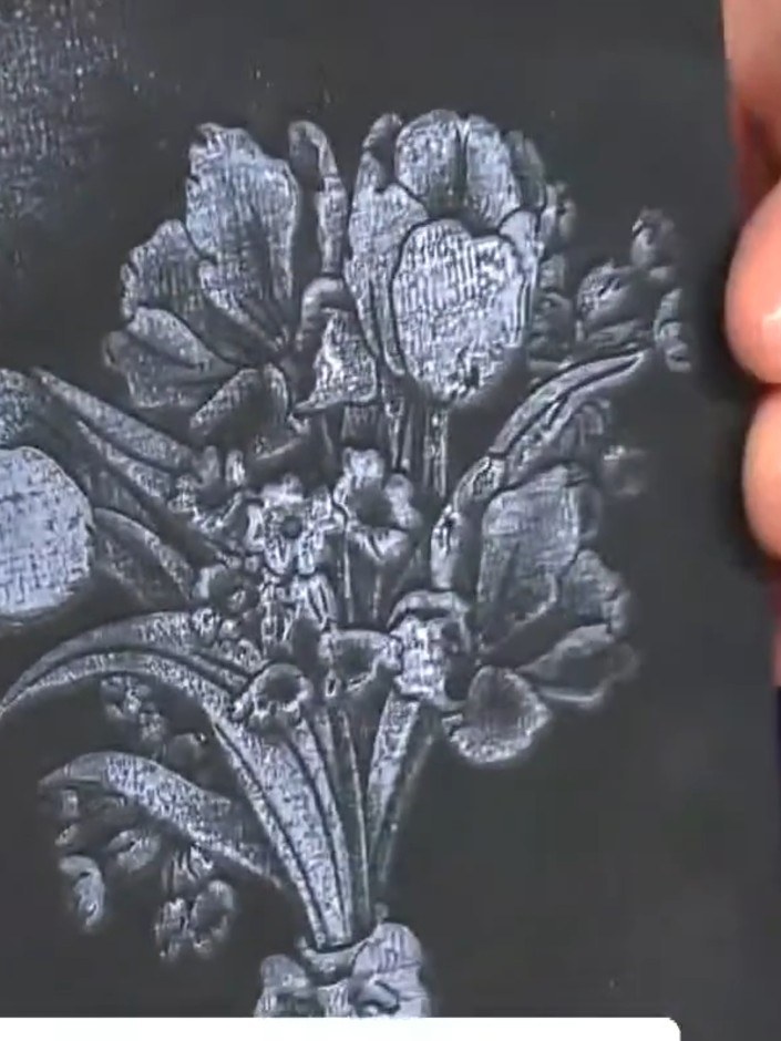 Step 6: Optional: Lightly swipe a coordinating ink pad around the debossed edges of the design to add subtle highlight