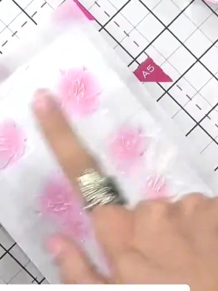 Step 9: Optional: soften any visible lines on the back of the vellum by applying more pink ink over them and blending 