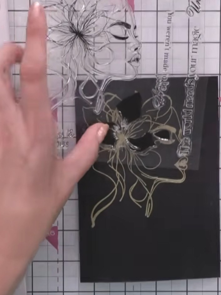 Step 2: Apply sticky ink to the lamination stamp, ensuring all the detail is well covered. The stamp features a floral