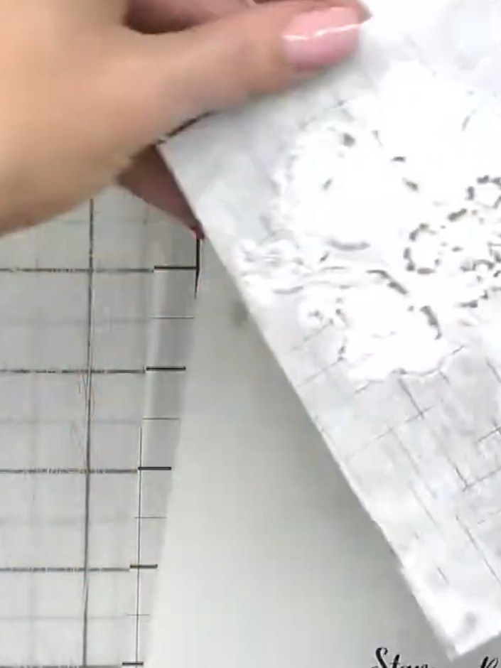 Step 1: Start with your embossed cardstock that has a clear raised design. Ensure the embossed pattern is visible and 