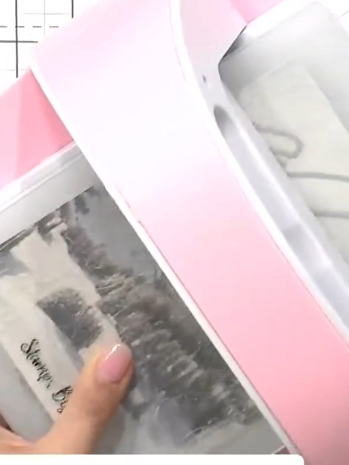 Step 5: Layer the first painted mount onto the card base using foam pads to add dimension.