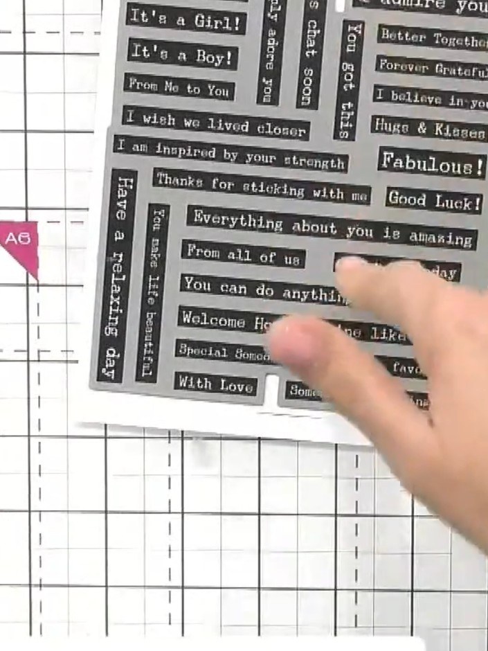 Step 6: Position your chosen sentiment sticker onto the card. You can reposition it before fully burnishing it down if