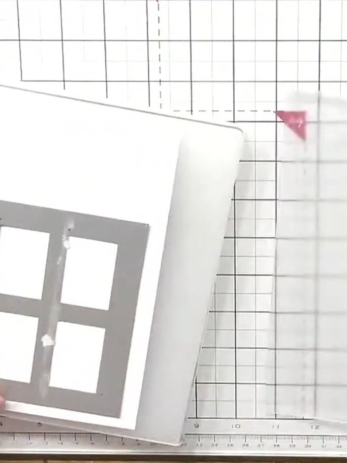 Step 1: Die-cut the four-window frame from white card stock using the Christmas Window die. Position the die on your w
