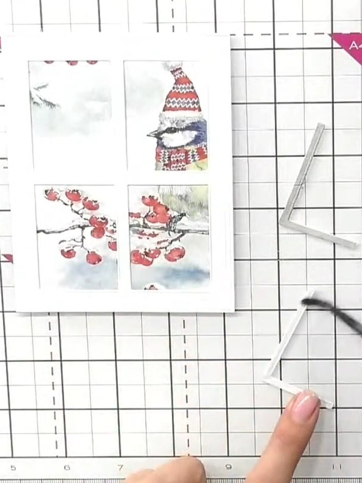 Step 3: Select a painted mount featuring a bird or scene from the Ruby Blooms paper pad. Position it behind one of the