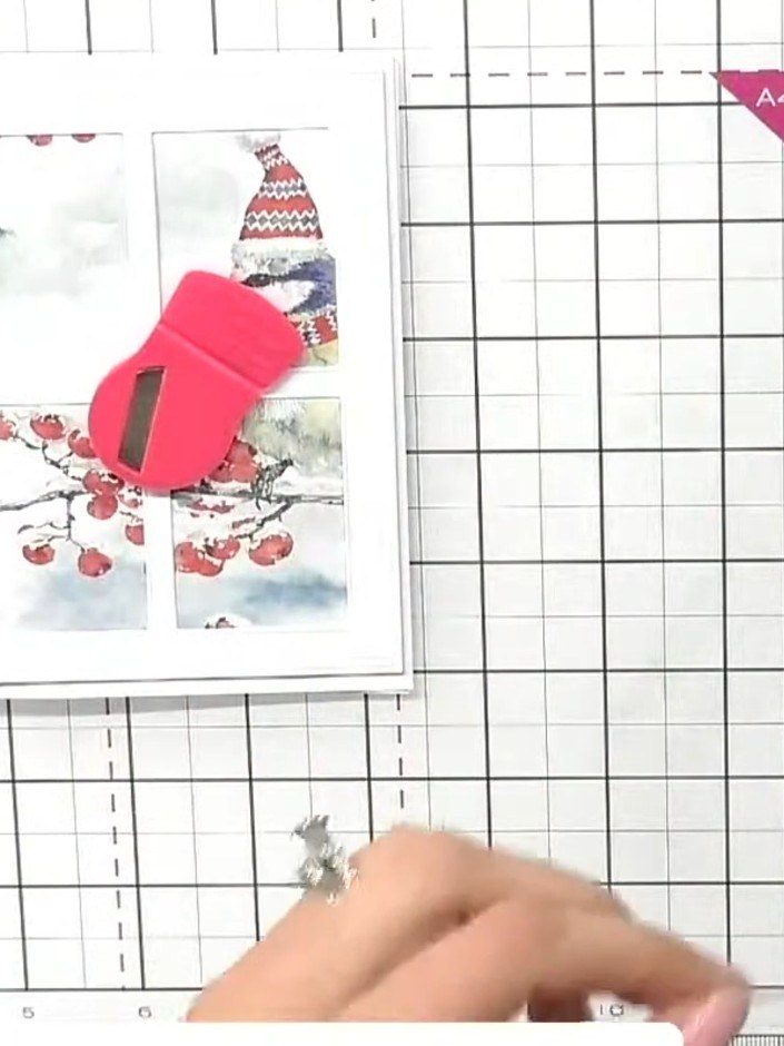 Step 5: Fussy cut a second bird from the Festive Friends Painted Mounts pack, cutting roughly around the edges to crea