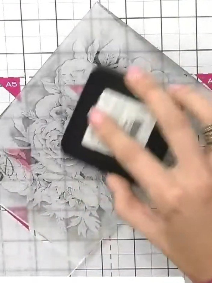 Step 2: Ink the embossing folder with black ink using a brush applicator. Apply the ink lightly to both the raised and