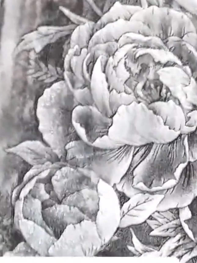 Step 6: Step back and assess your embossed design. The white highlights should bring specific elements like the peonie