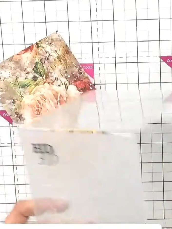 Step 7: Mount your embossed and highlighted panel onto a white card base using adhesive. Position the panel centrally 