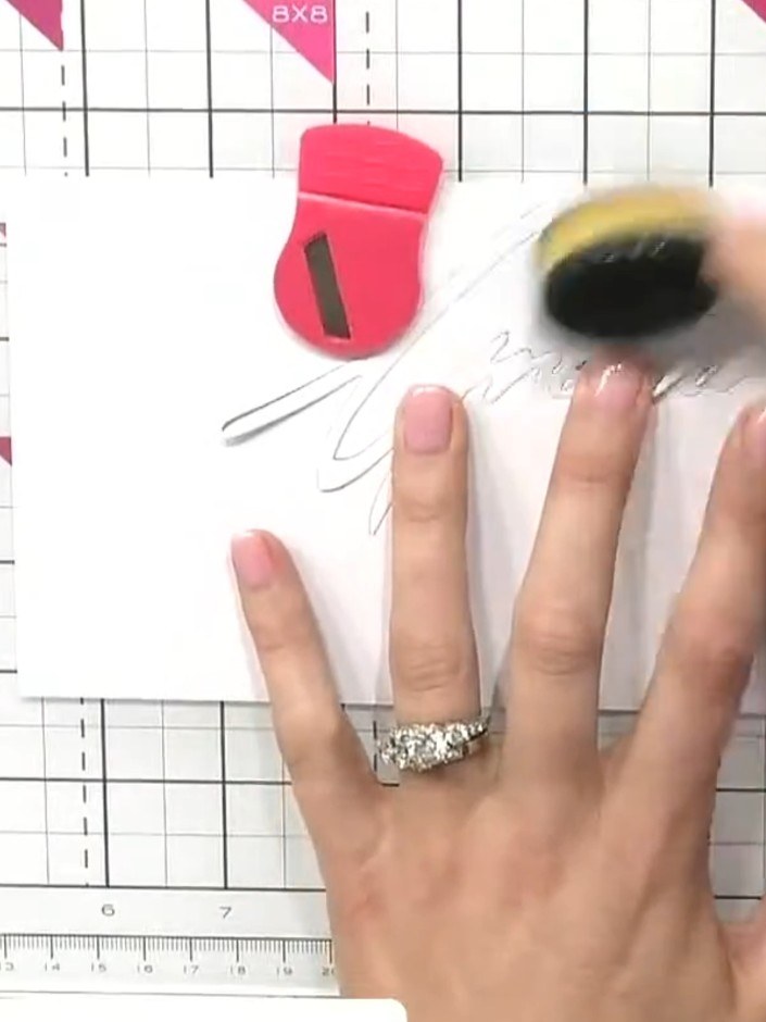 Step 2: Place the die back into the cutting plate to hold it steady. Use weathered wood and funky fossil ink with a bl