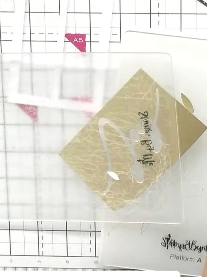 Step 1: Cut the 'Joy' word die from gold or satin-finish card using your die-cutting machine.