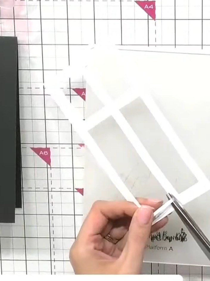 Step 5: Select a pre-printed mounted scene from your collection to place behind the window frame. Choose a design that