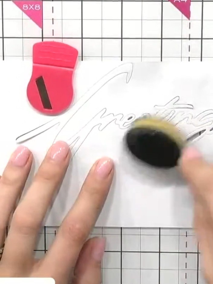 Step 3: Apply weathered wood distress ink to the top and bottom edges of the die-cut word using a blending brush, crea