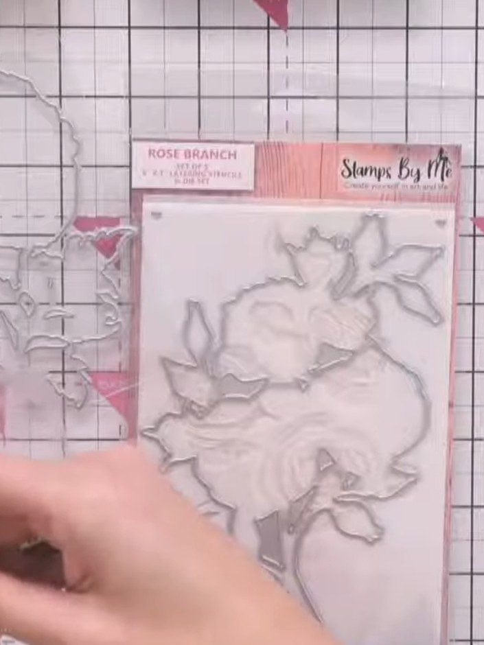 Step 1: Position the poppy stencil on your card base and secure it in place using magnets to prevent it from moving wh