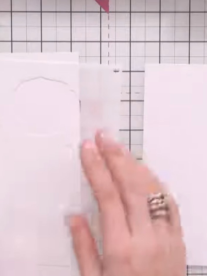Step 3: Remove the first stencil from your card. Line up the second stencil using the alignment guides marked on the s