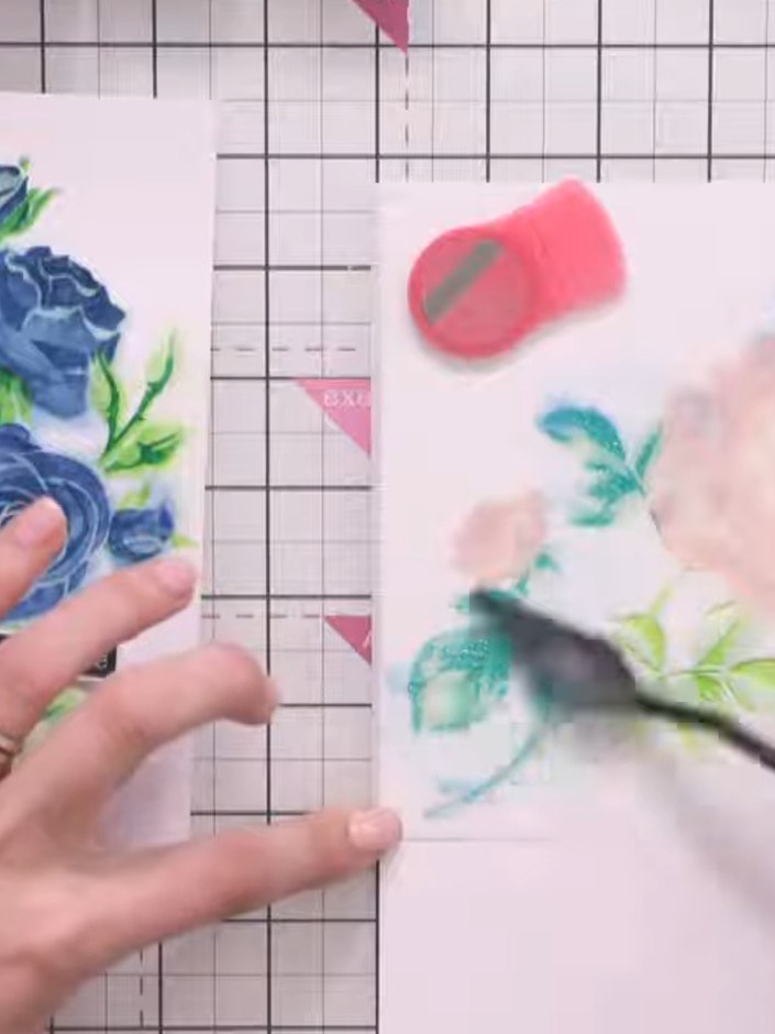 Step 10: Carefully lift and remove the stencil from the card to reveal the sparkly embellished floral design underneath